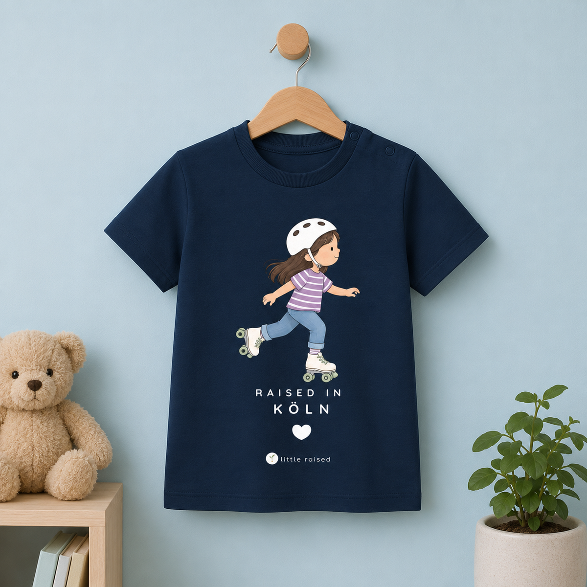 Baby T-Shirt aus Bio-Baumwolle: Raised in Köln (Citygirl)